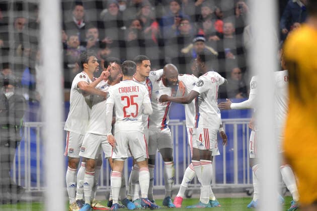 Joie de Moussa Dembele (lyon) et ses coequipiers FOOTBALL: Olympique Lyonnais vs FC Porto - Ligue Europa - 17 03 2022 FredericChambert Panoramic 