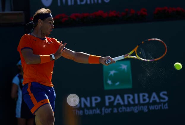 March 17, 2022 Rafael Nadal of Spain returns a shot against Nick Kyrgios of Australia during the 2022 BNP Paribas Open at Indian Wells Tennis Garden in Indian Wells, California. Mandatory Photo Credit: CSM. Indian Wells United States of America - ZUMAc04_ 20220317_zaf_c04_145 Copyright: xCharlesxBausx