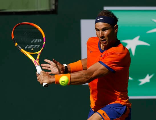 March 17, 2022, Indian Wells, California, USA: RAFAEL NADAL of Spain returns a shot against Nick Kyrgios of Australia during the 2022 BNP Paribas Open at Indian Wells Tennis Garden in Indian Wells. Indian Wells USA - ZUMAc04_ 20220317_zaf_c04_120 Copyright: xCharlesxBausx