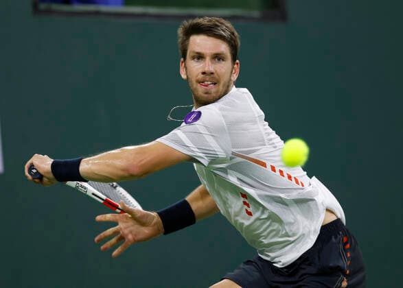 March 17, 2022 Cameron Norrie of Great Britain returns a shot against Carlos Alcaraz of Spain during the quarterfinals of the 2022 BNP Paribas Open at Indian Wells Tennis Garden in Indian Wells, California. Mandatory Photo Credit: CSM. Indian Wells United States of America - ZUMAc04_ 20220317_zaf_c04_150 Copyright: xCharlesxBausx