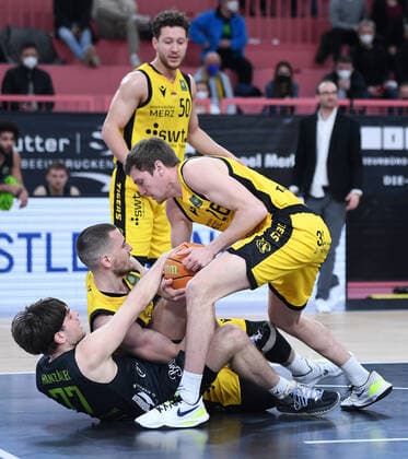 Basketball 2 Bundesliga 2020 2021 22 game day at Paul Horn Arena Tigers Tuebingen Team Ehinge Urspring 17 03 2022 fight for the ball Jakob Hanzalek left, Team Ehinge Urspring against Daniel Keppeler center, Tigers and Till Joenke right, Tigers and Joanic Gruettner Bacoul back, Tigers