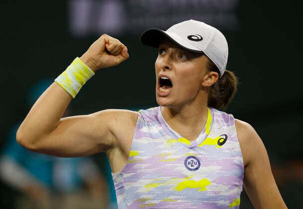 March 18, 2022 Iga Swiatek of Poland celebrates winning a point against Simona Halep of Romania in their semifinal match of the 2022 BNP Paribas Open at Indian Wells Tennis Garden in Indian Wells, California. Indian Wells United States of America - ZUMAc04_ 20220318_zaf_c04_158 Copyright: xCharlesxBausx