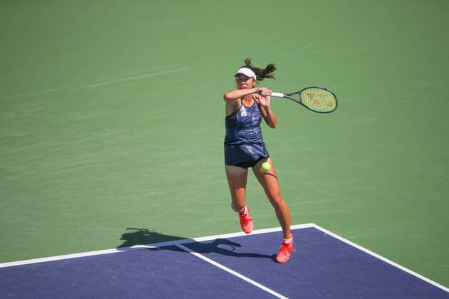 INDIAN WELLS, CA - MARCH 19: Ena Shibahara (JPN) hits a forehand during the doubles final of the BNP Paribas Open on March 19, 2022 at Indian Wells Tennis Garden in Indian Wells, CA. (Photo by George Walker Icon Sportswire) TENNIS: MAR 19 BNP Paribas Open Icon220319009
