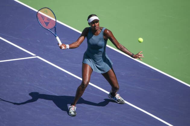 INDIAN WELLS, CA - MARCH 19: Asia Muhammad (USA) hits a volley during the doubles final of the BNP Paribas Open on March 19, 2022 at Indian Wells Tennis Garden in Indian Wells, CA. (Photo by George Walker Icon Sportswire) TENNIS: MAR 19 BNP Paribas Open Icon220319012