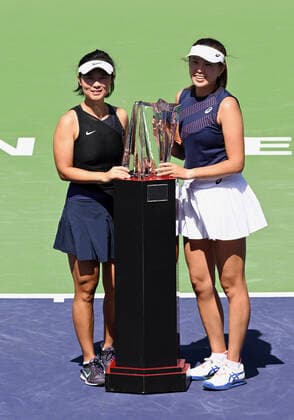 INDIAN WELLS, CA - MARCH 19: Yifan Xu of China and Zhaoxuan Yang of China with the winners trophy after the pair defeated Asia Muhammad of the United States and Ena Shibahara of Japan to become the women s doubles champions of the BNP Paribas Open played March 19, 2022 at the Indian Wells Tennis Garden in Indian Wells, CA. (Photo by John Cordes Icon Sportswire) TENNIS: MAR 19 BNP Paribas Open Icon506220319012