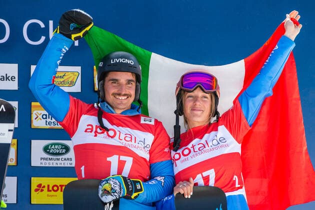 SNOWBOARDING - FIS WC Berchtesgaden BERCHTESGADEN,GERMANY,20.MAR.22 - SNOWBOARDING - FIS World Cup, mixed team event, ladies, men. Image shows Maurizio Bormolini (ITA) and Elisa Caffont (ITA).  GEPAxpictures xGintarexKarpaviciute