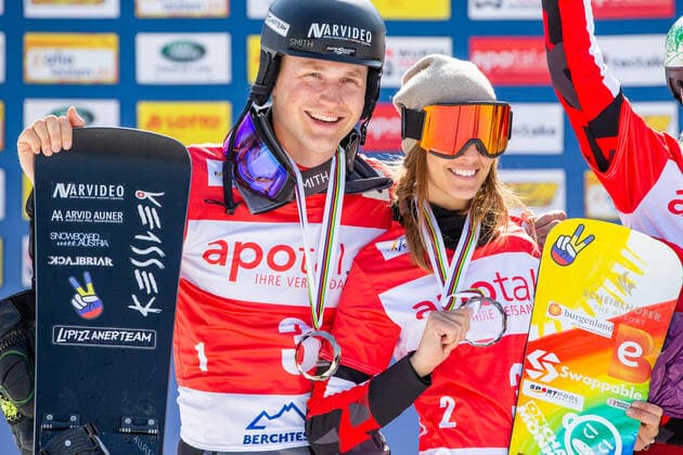 SNOWBOARDING - FIS WC Berchtesgaden BERCHTESGADEN,GERMANY,20.MAR.22 - SNOWBOARDING - FIS World Cup, mixed team event, ladies, men. Image shows Arvid Auner (AUT) and Julia Dujmovits (AUT).  GEPAxpictures xGintarexKarpaviciute