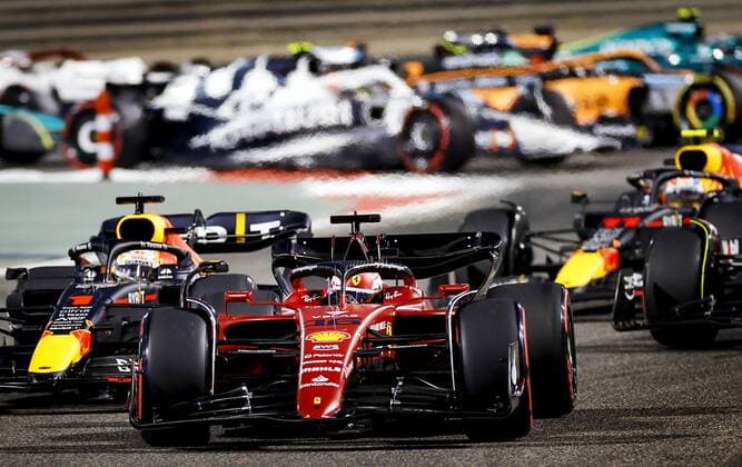 BAHRAIN Charles Leclerc 16 driving the Ferrari R and Max Verstappen 1 driving the Oracle Red Bull Racing RB18 Honda on track during the Bahrain F1 Grand Prix at the Bahrain International Circuit on March 20, 2022 in Bahrain, Bahrain ANP ROBIN VAN LONKHUIJSEN Bahrain,BAHREIN xVIxANPx xxANPxIVx 445851611 originalFilename: 0153089305st.jpg