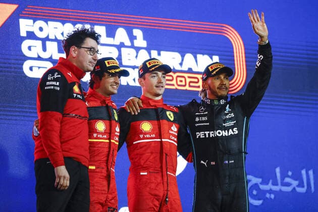 LECLERC Charles (mco), Scuderia Ferrari F1-75, portrait SAINZ Carlos (spa), Scuderia Ferrari F1-75, portrait BINOTTO Mattia (ita), Managing Director of the Scuderia Ferrari, portrait HAMILTON Lewis (gbr), Mercedes AMG F1 Team W13, portrait podium during the Formula 1 Gulf Air Bahrain Grand Prix 2022, 1st round of the 2022 FIA Formula One World Championship, WM, Weltmeisterschaft on the Bahrain International Circuit, from March 18 to 20, 2022 in Sakhir, Bahrain - F1 - BAHRAIN GRAND PRIX 2022 - RACE DPPI Panoramic  00122005__B3_9597
