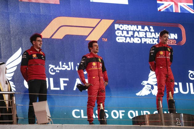 LECLERC Charles (mco), Scuderia Ferrari F1-75, portrait SAINZ Carlos (spa), Scuderia Ferrari F1-75, portrait BINOTTO Mattia (ita), Managing Director of the Scuderia Ferrari, portrait podium during the Formula 1 Gulf Air Bahrain Grand Prix 2022, 1st round of the 2022 FIA Formula One World Championship, WM, Weltmeisterschaft on the Bahrain International Circuit, from March 18 to 20, 2022 in Sakhir, Bahrain - F1 - BAHRAIN GRAND PRIX 2022 - RACE DPPI Panoramic  00122005__R5_1418