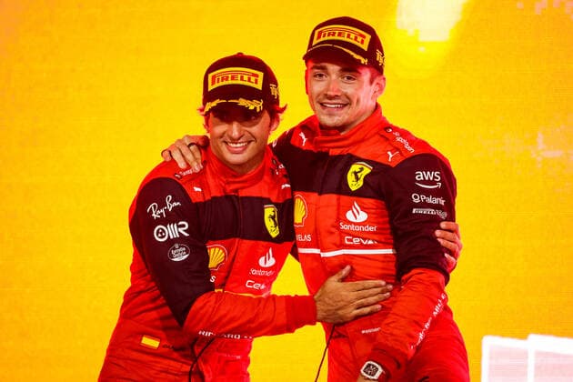LECLERC Charles (mco), Scuderia Ferrari F1-75, portrait celebrating victory on the podium with SAINZ Carlos (spa), Scuderia Ferrari F1-75, portraitduring the Formula 1 Gulf Air Bahrain Grand Prix 2022, 1st round of the 2022 FIA Formula One World Championship, WM, Weltmeisterschaft on the Bahrain International Circuit, from March 18 to 20, 2022 in Sakhir, Bahrain - F1 - BAHRAIN GRAND PRIX 2022 - RACE DPPI Panoramic  20220320_G00D0629
