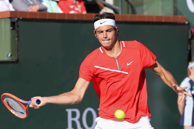 INDIAN WELLS, CA - MARCH 20: Taylor Fritz (USA) hits a forehand during the BNP Paribas Open MenÕs Final on March 20, 2022 at Indian Wells Tennis Garden in Indian Wells, CA. (Photo by George Walker Icon Sportswire) TENNIS: MAR 20 BNP Paribas Open Men s Final Icon220320036