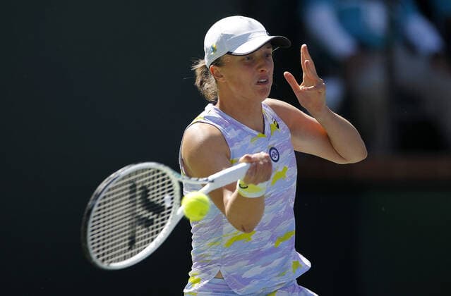 Mandatory Credit: Photo by Ella Ling Shutterstock (12853677bm) Iga Swiatek of Poland in action BNP Paribas Open, Tennis, Day 12, Indian Wells Tennis Garden, California, USA - 20 Mar 2022 BNP Paribas Open, Tennis, Day 12, Indian Wells Tennis Garden, California, USA - 20 Mar 2022 Copyright: xEllaxLing Shutterstockx 12853677bm