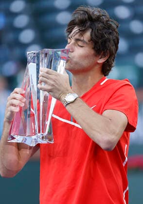 March 20, 2022 Taylor Fritz kisses the winner s trophy after defeating Rafael Nadal of Spain during the finals match of the 2022 BNP Paribas Open at Indian Wells Tennis Garden in Indian Wells, California. Indian Wells United States of America - ZUMAc04_ 20220320_zaf_c04_069 Copyright: xCharlesxBausx