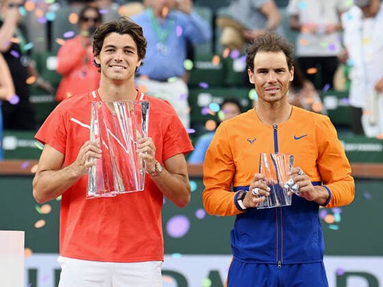 INDIAN WELLS, CA - MARCH 20: Taylor Fritz of the United States with the championship trophy and Rafael Nadal of Spain with the runners-up trophy after playing in a tennis match at the BNP Paribas Open finals played on March 20, 2022 at the Indian Wells Ennis Garden in Indian Wells, CA. (Photo by John Cordes Icon Sportswire) TENNIS: MAR 20 BNP Paribas Open Men s Final Icon506220320228