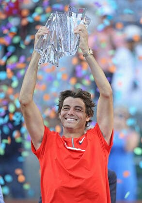 American Taylor Fritz holds the championship trophy after winning his men s final match against Rafael Nadal of Spain at the BNP Paribas Open in Indian Wells, California on Sunday, March 20, 2022. Fritz defeated Nadal 6-3, 7-6 (5) to win the championship and his first ATP, Tennis Herren Masters 1000 tournament.  IDW20220320019 DAVIDxSILPA