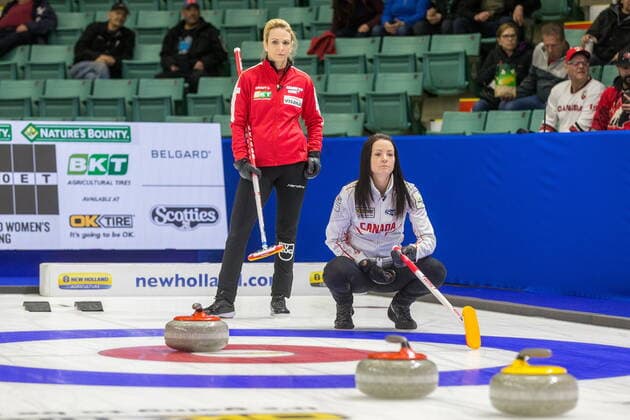 March 20, 2022, Prince George, BC, CANADA: Canada skip Kerri Einarson sets a target for her teammates while Switzerland skip Silvana Tirinzoni looks on at CN Centre on Sunday evening during at the Women s World Curling in Prince George, B.C., Sunday, March 20, 2022. Canada News - March 20, 2022  - ZUMAc35_ 20220320_zaf_c35_117 Copyright: xJamesxDoylex