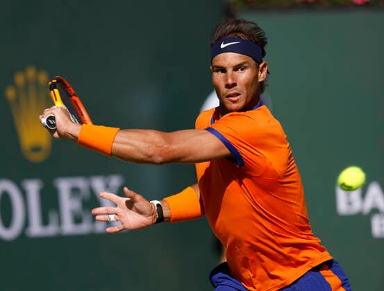March 20, 2022 Rafael Nadal of Spain returns a shot against Taylor Fritz during the finals match of the 2022 BNP Paribas Open at Indian Wells Tennis Garden in Indian Wells, California. Indian Wells United States of America - ZUMAc04_ 20220320_zaf_c04_141 Copyright: xCharlesxBausx