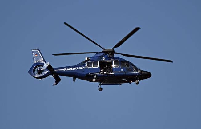 23 03 2022, xjhx, football UEFA, Germany DFB national team training emspor, v l A helicopter of the Federal Police circles over the stadium grounds DFL DFB REGULATES PROHIBIT ANY USE OF PHOTOGRAPHS as IMAGE SEQUENCES and or QUASI VIDEO Frankfurt am Main