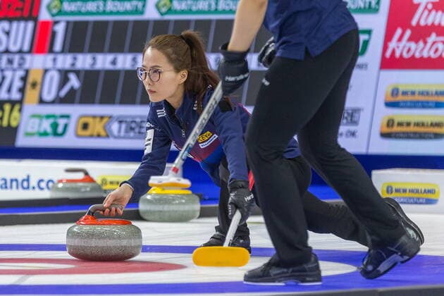 March 23, 2022, Prince George, BC, Canada: South Korea skip EunJung Kim throws a stone against Denmark at the Women s World Curling Championship in Prince George, B.C., on Wednesday, March 23, 2022. Canada News - March 23, 2022  - ZUMAc35_ 20220323_zaf_c35_090 Copyright: xJamesxDoylex