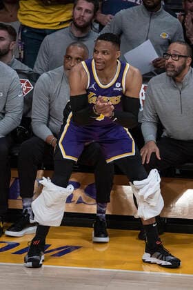 March 23, 2022, Los Angeles, California, USA: Russell Westbrook 0 of the Los Angeles Lakers cheers from the bench during their NBA, Basketball Herren, USA game against the Philadelphia 76ers on Wednesday March 23, 2022 at Crypto.com Arena in Los Angeles, California. PI Los Angeles USA - ZUMAp124 20220323_zaa_p124_007 Copyright: xJAVIERxROJASx