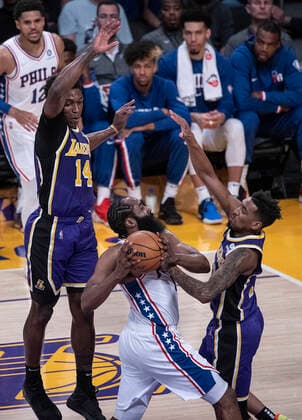 March 23, 2022, Los Angeles, California, USA: James Harden 1 of the Philadelphia 76ers is blocked by Malik Monk 11 of the Los Angeles Lakers as he puts up a layup during their NBA, Basketball Herren, USA game on Wednesday March 23, 2022 at Crypto.com Arena in Los Angeles, California. PI Los Angeles USA - ZUMAp124 20220323_zaa_p124_013 Copyright: xJAVIERxROJASx