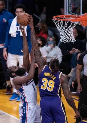 March 23, 2022, Los Angeles, California, USA: James Harden 1 of the Philadelphia 76ers is blocked by Dwight Howard 39 of the Los Angeles Lakers as he puts up a layup during their NBA, Basketball Herren, USA game on Wednesday March 23, 2022 at Crypto.com Arena in Los Angeles, California. PI Los Angeles USA - ZUMAp124 20220323_zaa_p124_015 Copyright: xJAVIERxROJASx