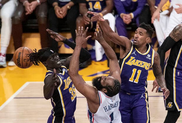 March 23, 2022, Los Angeles, California, USA: James Harden 1 of the Philadelphia 76ers is blocked by Wenyen Gabriel 35 and Malik Monk 11 of the Los Angeles Lakers during their NBA, Basketball Herren, USA game on Wednesday March 23, 2022 at Crypto.com Arena in Los Angeles, California. Lakers lose to 76ers, 121-126. PI Los Angeles USA - ZUMAp124 20220323_zaa_p124_028 Copyright: xJAVIERxROJASx