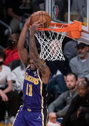 March 23, 2022, Los Angeles, California, USA: Malik Monk 11 of the Los Angeles Lakers goes for a reverse dunk during their NBA, Basketball Herren, USA game against the Philadelphia 76ers on Wednesday March 23, 2022 at Crypto.com Arena in Los Angeles, California. Lakers lose to 76ers, 121-126. PI Los Angeles USA - ZUMAp124 20220323_zaa_p124_033 Copyright: xJAVIERxROJASx