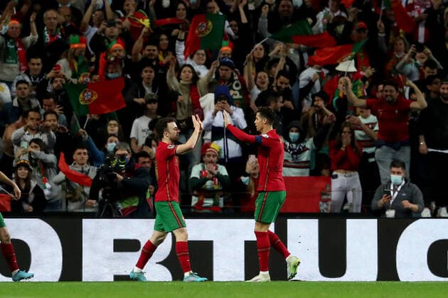 March 24, 2022, Porto, Portugal: Portugal s forward Diogo Jota (L) celebrates with Cristiano Ronaldo after scoring a goal during the 2022 FIFA World Cup, WM, Weltmeisterschaft, Fussball Qualifier knockout round play-off football match between Portugal and Turkey at the Dragao stadium in Porto, Portugal, on March 24, 2022. Porto Portugal - ZUMAf123 20220324_zap_f123_005 Copyright: xPedroxFiuzax