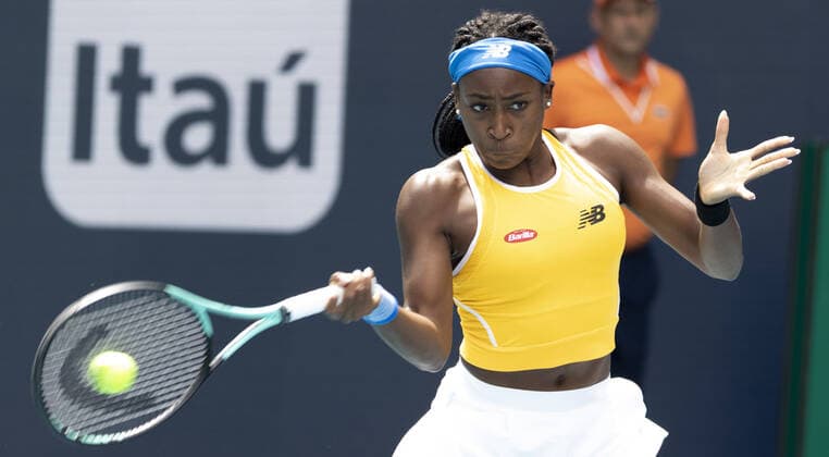Cori Gauff from the USA returns the ball back to Qiang Wang from China at the Miami Open in the Hard Rock Stadium in Miami Gardens, Florida, on Friday, March 25, 2022. Gauff defeated Wang 7-5, 6-4.  MIA20220325103 GARYxIxROTHSTEIN