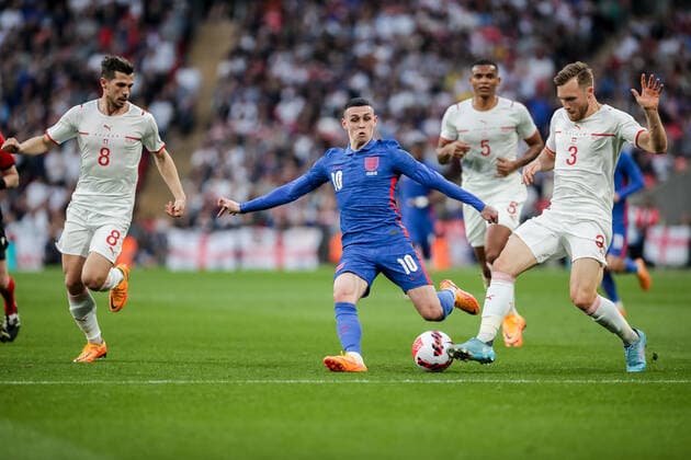 LONDON, ENGLAND MARCH 26 during the international friendly match between England and Switzerland at Wembley Stadium on March 26, 2022 in London, United Kingdom Phil Foden of England against Silvan Widmer of Switzerland and Remo Freuler of Switzerland London Wembley Stadium England United Kingdom  Copyright: xJustPictures.chx xRichardxCallisx