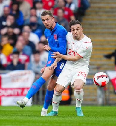 Mandatory Credit: Photo by Javier Garcia Shutterstock (12865321u) Jordan Henderson of England and Xherdan Shaqiri of Switzerland England v Switzerland, International Friendly, Länderspiel, Nationalmannschaft Football, Wembley Stadium, London, UK - 26 Mar 2022 EDITORIAL USE ONLY No use with unauthorised audio, video, data, fixture lists, club league logos or live services. Online in-match use limited to 120 images, no video emulation. No use in betting, games or single club league player publications. England v Switzerland, International Friendly, Football, Wembley Stadium, London, UK - 26 Mar 2022 EDITORIAL USE ONLY No use with unauthorised audio, video, data, fixture lists, club league logos or live services. Online in-match use limited to 120 images, no video emulation. No use in betting, games or single club league player publications. Copyright: xJavierxGarcia Shutterstockx 12865321u