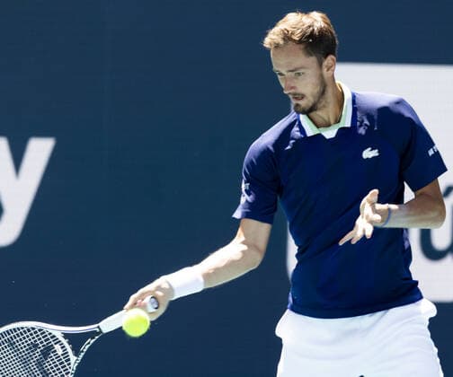 Daniil Medvedev from Russia returns a forehand shot to Andy Murray from Great Britain at the Miami Open in the Hard Rock Stadium in Miami Gardens, Florida, on Saturday, March 26, 2022.  MIA20220326102 GARYxIxROTHSTEIN