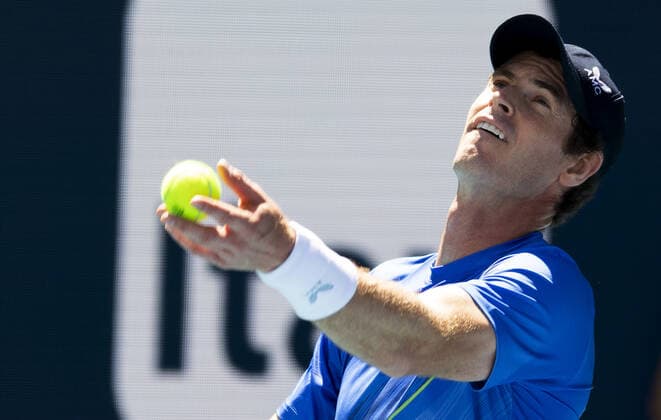 Andy Murray from Great Britain serves to Daniil Medvedev from Russia at the Miami Open in the Hard Rock Stadium in Miami Gardens, Florida, on Saturday, March 26, 2022. Medvedev defeated Murray 6-4, 6-2.  MIA20220326107a GARYxIxROTHSTEIN