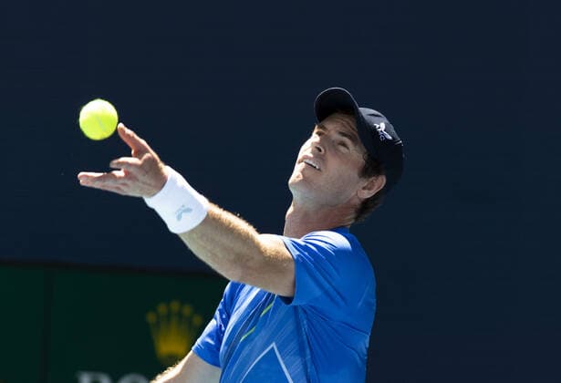 Andy Murray from Great Britain serves to Daniil Medvedev from Russia at the Miami Open in the Hard Rock Stadium in Miami Gardens, Florida, on Saturday, March 26, 2022. Medvedev defeated Murray 6-4, 6-2.  MIA20220326109 GARYxIxROTHSTEIN