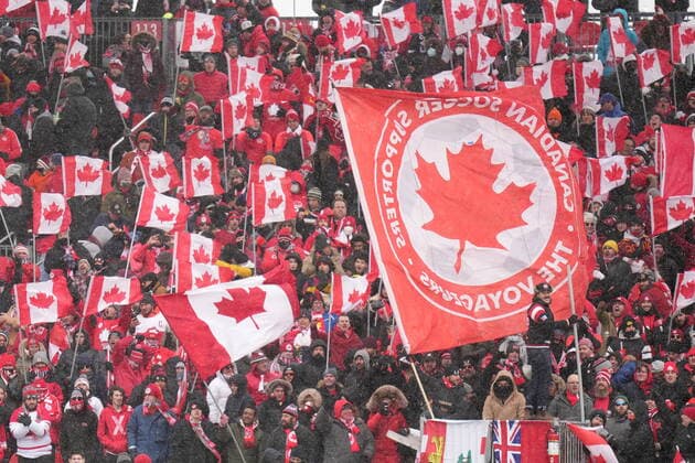 March 27, 2022, TORONTO, ON, CANADA: Fans cheer and wave Canadian flags before the start of the Canada-Jamaica CONCACAF World Cup soccer qualifying action in Toronto on Sunday, March 27, 2022. Canada News - March 27, 2022  - ZUMAc35_ 20220327_zaf_c35_066 Copyright: xNathanxDenettex