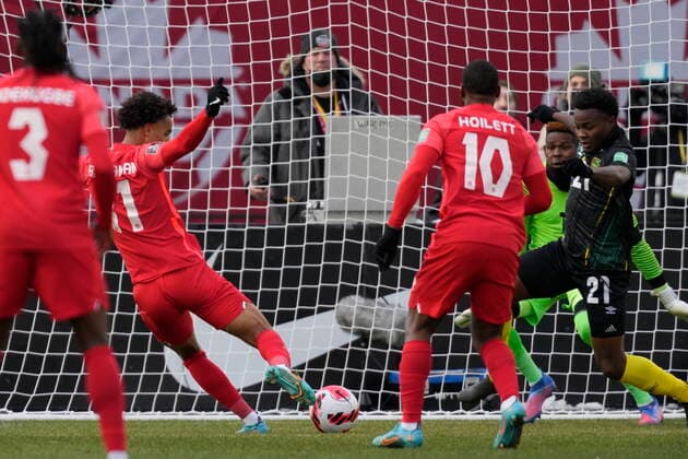 March 27, 2022, TORONTO, ON, CANADA: Canada s Tajon Buchanan scores against Jamaica as teammate Junior Hoilett looks on during first half CONCACAF World Cup soccer qualifying action in Toronto on Sunday, March 27, 2022. Canada News - March 27, 2022  - ZUMAc35_ 20220327_zaf_c35_106 Copyright: xFrankxGunnx