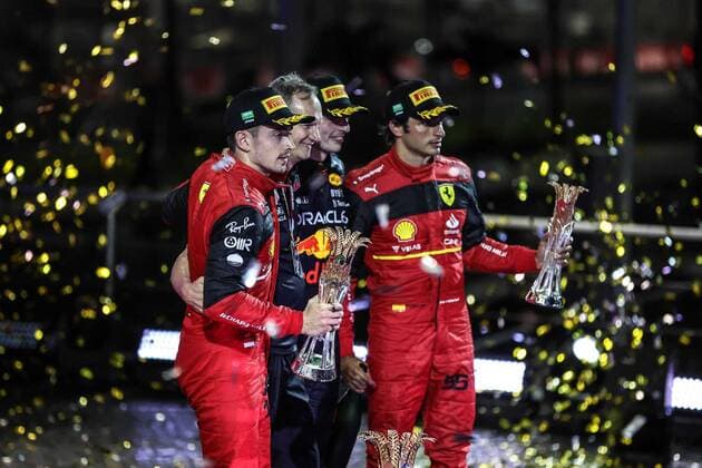 (220328) -- JEDDAH, March 28, 2022 -- (From L to R)Ferrari s driver Charles Leclerc of Monaco, Red Bull Racing s Chief Engineer Paul Monaghan, Red Bull s driver Max Verstappen of the Netherlands and Ferrari s driver Carlos Sainz Jr. of Spain pose for pictures on the podium after the 2022 Saudi Arabian Grand Prix at Jeddah Corniche Circuit in Jeddah, Saudi Arabia on March 27, 2022. (Saudi Ministry of Media Handout via Xinhua) (SP)SAUDI ARABIA-JEDDAH-F1-SAUDI ARABIAN GRAND PRIX WangxHaizhou 