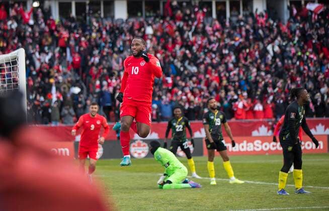 (220328) -- TORONTO, March 28, 2022 -- Junior Hoilett (Front) of Canada celebrates scoring during the FIFA World Cup, WM, Weltmeisterschaft, Fussball CONCACAF qualifiers match between Canada and Jamaica in Toronto, Canada, on March 27, 2022. (Photo by Zou Zheng Xinhua) (SP)CANADA-TORONTO-SOCCER-FIFA WORLD CUP QUALIFICATION-CANADA VS JAMAICA LinxWei 