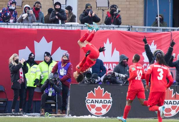 (220328) -- TORONTO, March 28, 2022 -- Tajon Buchanan (C) of Canada celebrates scoring during the FIFA World Cup, WM, Weltmeisterschaft, Fussball CONCACAF qualifiers match between Canada and Jamaica in Toronto, Canada, on March 27, 2022. (Photo by Zou Zheng Xinhua) (SP)CANADA-TORONTO-SOCCER-FIFA WORLD CUP QUALIFICATION-CANADA VS JAMAICA LinxWei 