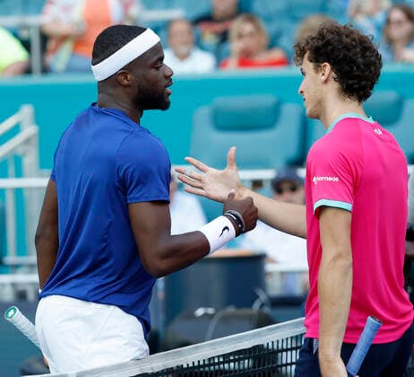 March 27, 2022, Miami Gardens, Florida, United States Of America: MIAMI GARDENS, FLORIDA - MARCH 27: Frances Tiafoe of United States defeats Juan Manuel CeroÂºndolo of Argentina during day 7 of the 2022 Miami Open at Hard Rock Stadium on March 27, 2022 in Miami Gardens, Florida....People: Frances Tiafoe, Juan Manuel Cerundolo Miami Gardens United States Of America - ZUMAs214 20220327_zda_s214_148 Copyright: xSMGx