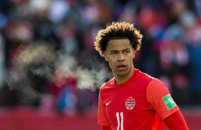 (220328) -- TORONTO, March 28, 2022 -- Tajon Buchanan (C) of Canada reacts during the FIFA World Cup, WM, Weltmeisterschaft, Fussball CONCACAF qualifiers match between Canada and Jamaica in Toronto, Canada, on March 27, 2022. (Photo by Zou Zheng Xinhua) (SP)CANADA-TORONTO-SOCCER-FIFA WORLD CUP QUALIFICATION-CANADA VS JAMAICA LinxWei 