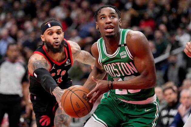 March 28, 2022, Toronto, ON, CANADA: Toronto Raptors guard Gary Trent Jr. (33) strips the ball from Boston Celtics forward Aaron Nesmith (26) during first half NBA, Basketball Herren, USA basketball action in Toronto, Monday, March 28, 2022. Celtics at Raptors NBA  - ZUMAc35_ 20220328_zaf_c35_064 Copyright: xFrankxGunnx