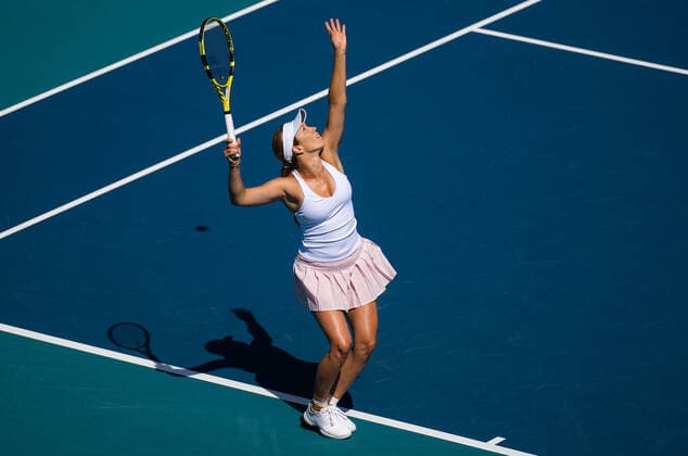 March 28, 2022, MIAMI, FLORIDA, UNITED STATES: Danielle Collins of the United States in action during the fourth round of the 2022 Miami Open WTA, Tennis Damen 1000 tennis tournament against Ons Jabeur of Tunisia MIAMI UNITED STATES - ZUMAa181 20220328_zaa_a181_001 Copyright: xRobxPrangex