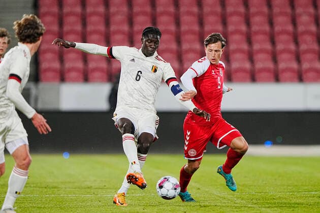 Belgiums Amadou Onana in match with Denmarks William Boeving Vick during the European Championship qualifier for the U21 national team between Denmark and Belgium, at MCH Arena in Herning, Tuesday 29 March 2022, Herning Denmark  Copyright: BoxAmstrupx xRitzauxScanpix BoxAmstrupx xRitzauxScanpixx COP102 spdk20220329-205856-L