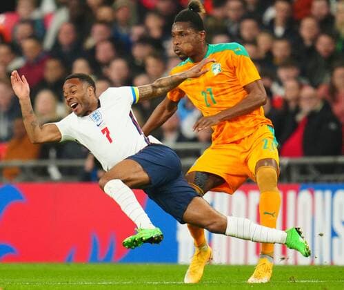 Mandatory Credit: Photo by Javier Garcia Shutterstock (12870107m) Simon Deli of Ivory Coast fouls Raheem Sterling of England England v Ivory Coast, International Friendly, Länderspiel, Nationalmannschaft Football, Wembley Stadium, London, UK - 29 Mar 2022 England v Ivory Coast, International Friendly, Football, Wembley Stadium, London, UK - 29 Mar 2022 Copyright: xJavierxGarcia Shutterstockx 12870107m