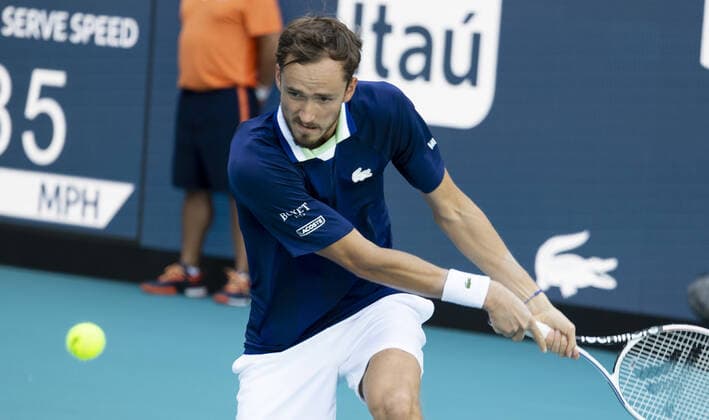 Danil Medvedev from Russia returns a two handed backhand to Jenson Brooksby from the USA at the Miami Open in the Hard Rock Stadium in Miami Gardens, Florida, on Tuesday, March 29, 2022. Medvedev defeated Brooksby 7-5, 6-1.  MIA20220329121 GARYxIxROTHSTEIN