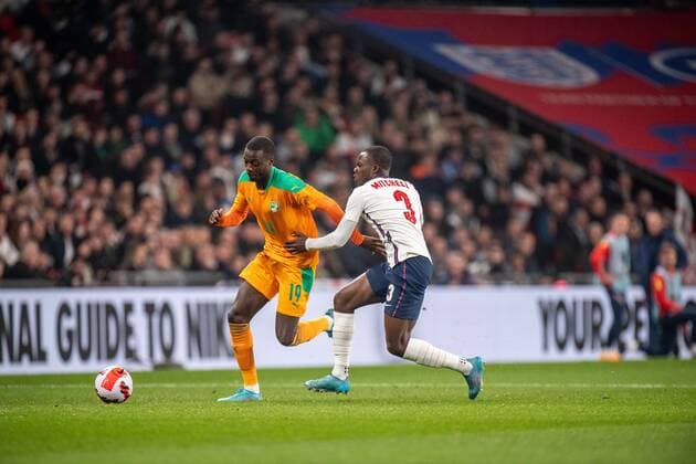 LONDON, ENGLAND - MARCH 29: Tyrick Mitchell of England and Nicolas Pepe of CÃ te d Ivoire during the International Friendly, Länderspiel, Nationalmannschaft match between England and Ivory Coast at Wembley Stadium on March 29, 2022 in London, E England v Ivory Coast - International Friendly Copyright: xSebastianxFrejx