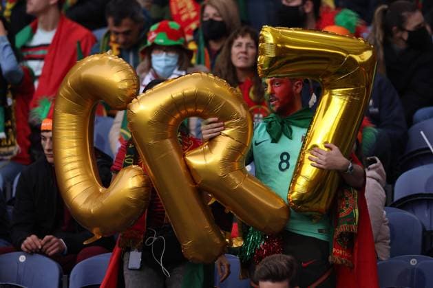 Porto, Portugal, 29th March 2022. Fans hold up inflatable letters to spell out CR7 for Cristiano Ronaldo of Portugal during the FIFA World Cup, WM, Weltmeisterschaft, Fussball 2022 - European Qualifying match at the Estadio do Dragao, Porto. Picture credit should read: Jonathan Moscrop Sportimage EDITORIAL USE ONLY. No use with unauthorised audio, video, data, fixture lists, club league logos or live services. Online in-match use limited to 120 images, no video emulation. No use in betting, games or single club league player publications. SPI-1609-0106